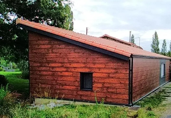 Extension en Ossature Bois avec Bardage Moderne